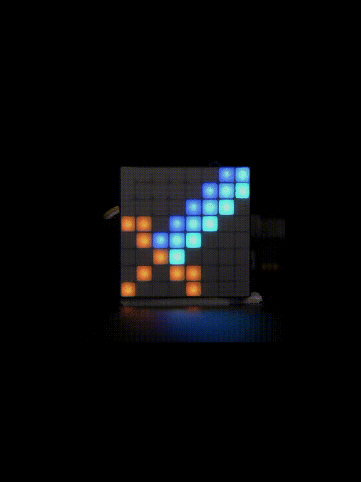 Animated LED matrix displaying scrolling blue and orange pixel patterns