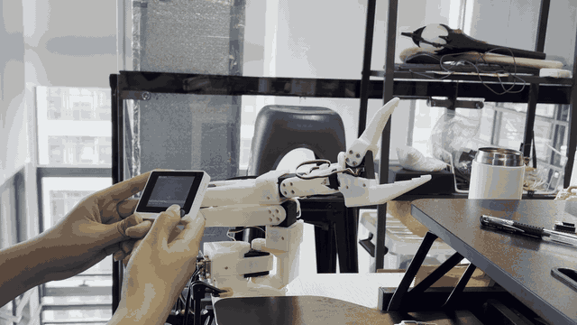 Affordable robotic arm controller.gif