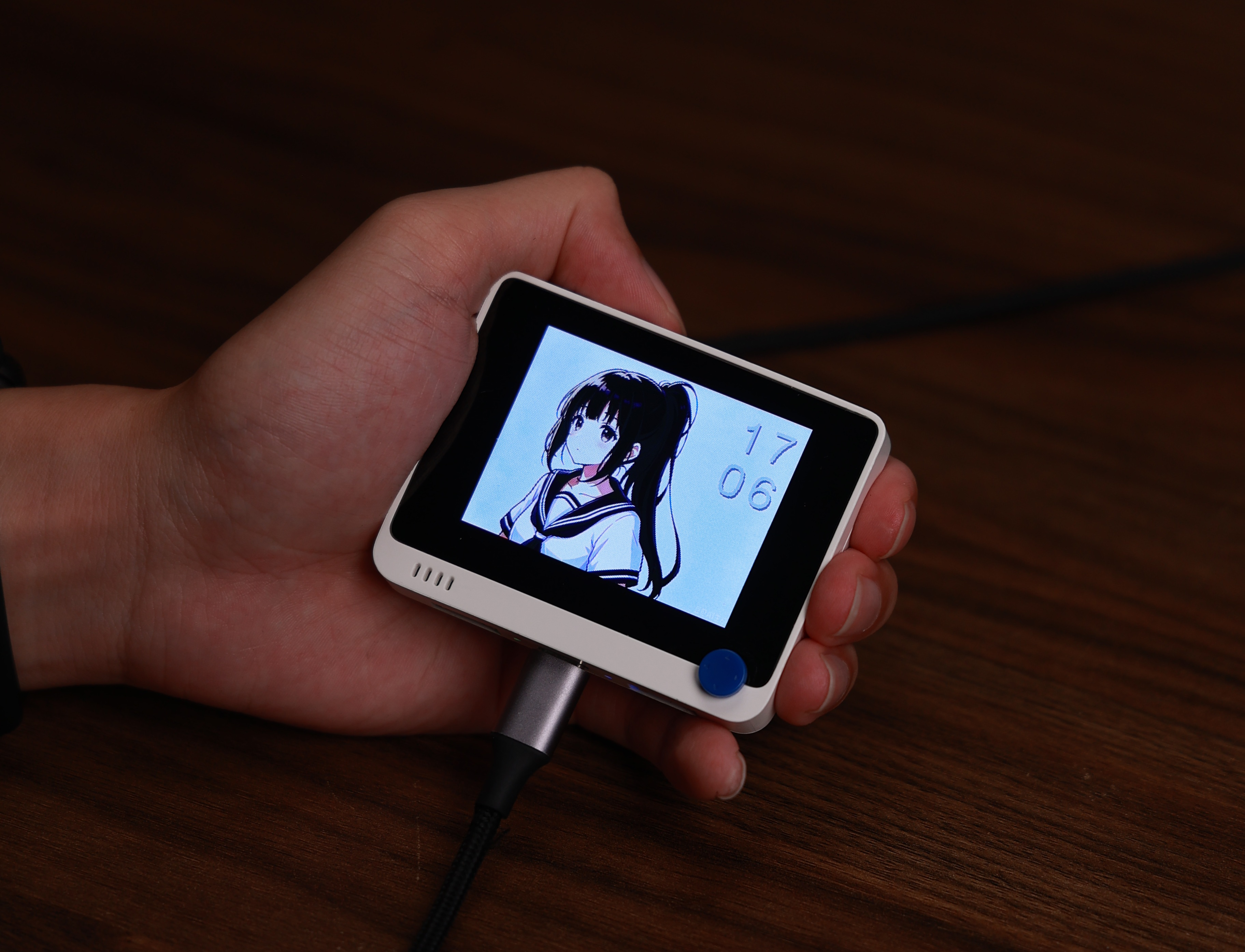 Wio Terminal displaying a custom anime desktop clock